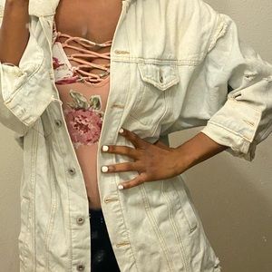 Oversized tattered Jean jacket.